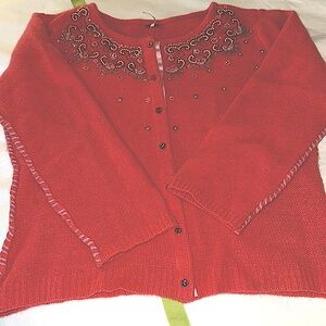 LOOK Free people Brand size S peach sweater never worn. Very unique detail.